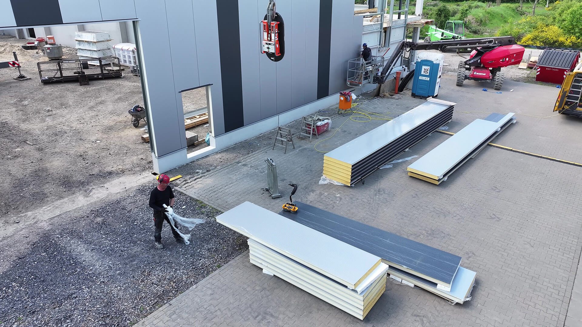 Gebäudebau - Arbeiter am Werk
